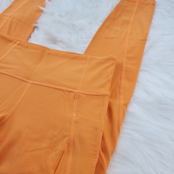 NWOT Athleta Orange Salutation Pocket Leggings - Picture 4 of 6